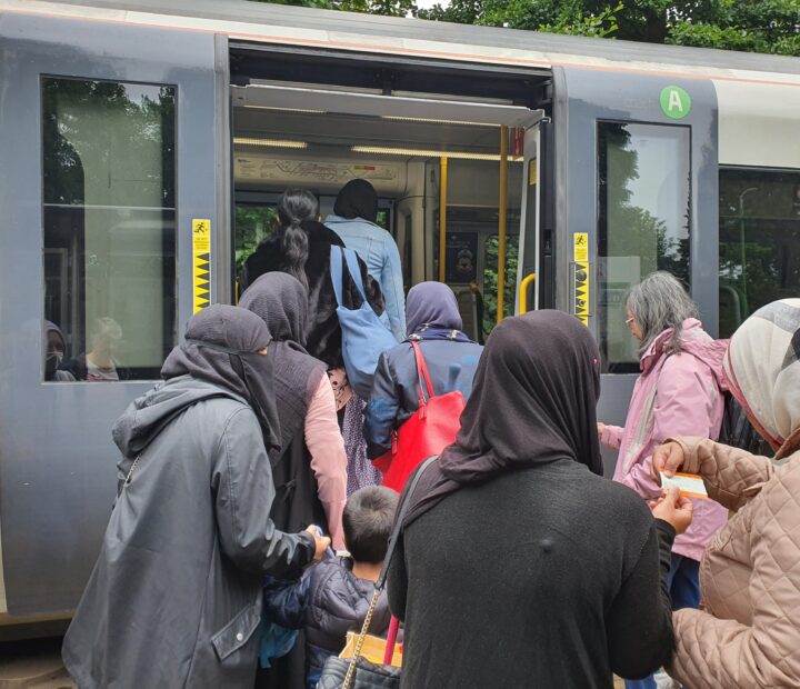 A group of Muslim women boarding a train in the UK