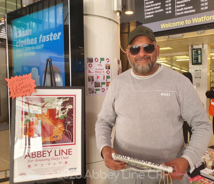 Passer-by at a Community Rail information stand