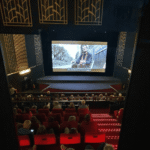 People watching a film in a cinema