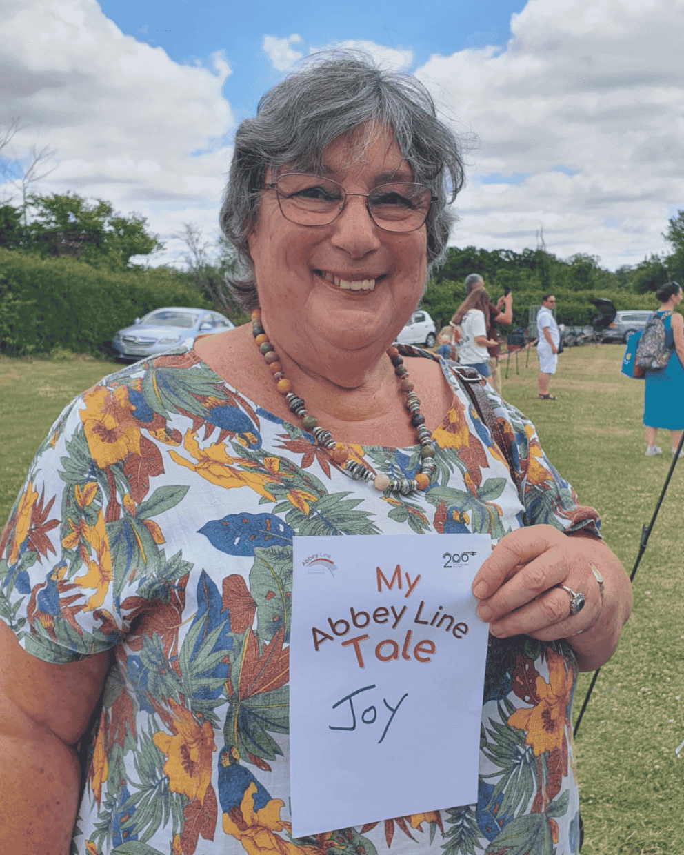 A person holding up a sign