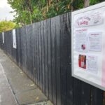 Posters at a train station