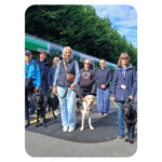 Guide dog puppies in training on the Abbey Line trainline