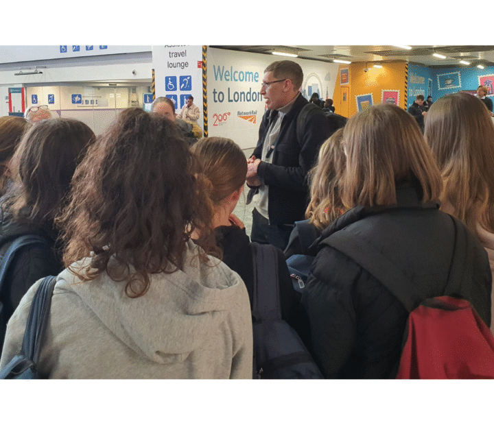 Students at a train station