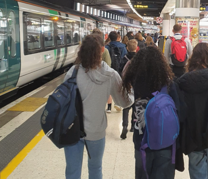 Students at a train station