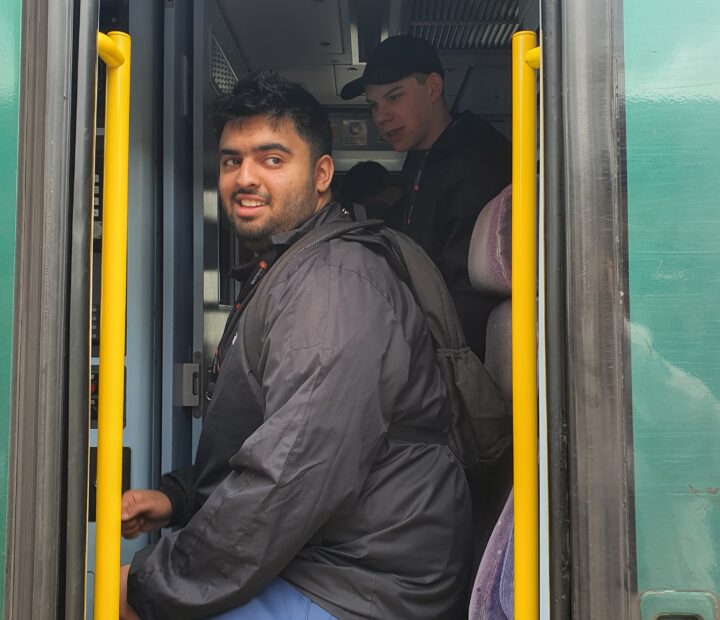 A young person on a train