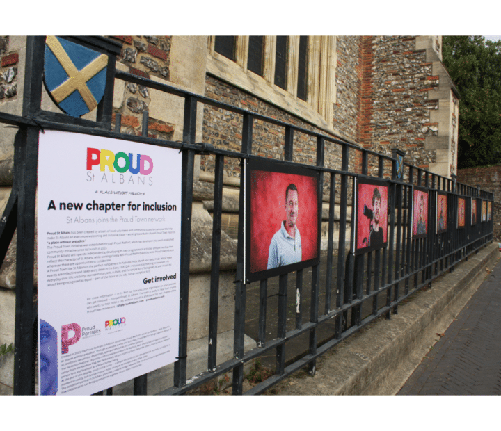 An outdoor portrait exhibition on railings